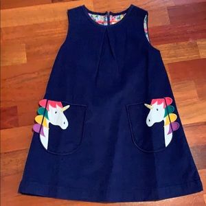 Girls blue corduroy dress, unicorn pocket detail
